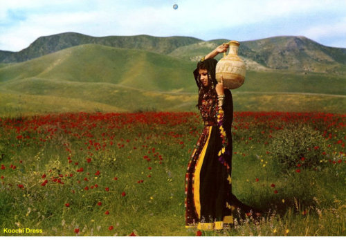 A photograph from a 1973 Ariana Afghan Airlines calendar: “Koochi dress.” What a beautiful place&hel