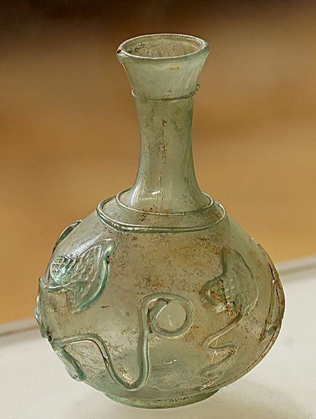 theancientworld:Bottle with ivy leaves decoration. Blownglass, second half of the 2nd century CE–3rd