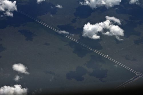 365/142 - Clouds I on Flickr.Via Flickr: Clouds casting shadow on the ground below.