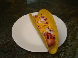 scrotumcoat:  mobsixtoo:  dvda:  Necessity is the mother of invention. I ran out of buns so I had to improvise. I give you the TacoDog©.  brilliant!  coming soon to a taco bell near you 