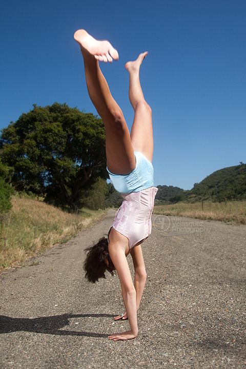 I simply asked if she could do a cart wheel and she did it barefoot on the hot road. I love a lady with dedication to the photographer. Comments/Questions?