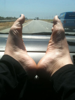feetformylove:  Feet fun on the dashboard &lt;3