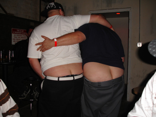 A couple of chubbies enjoy showing off their bum cleavages.