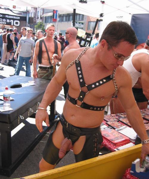 Showing off at the street fair.  [ #gayporn #gay #porn #leather #uncut #public #exhibitionist