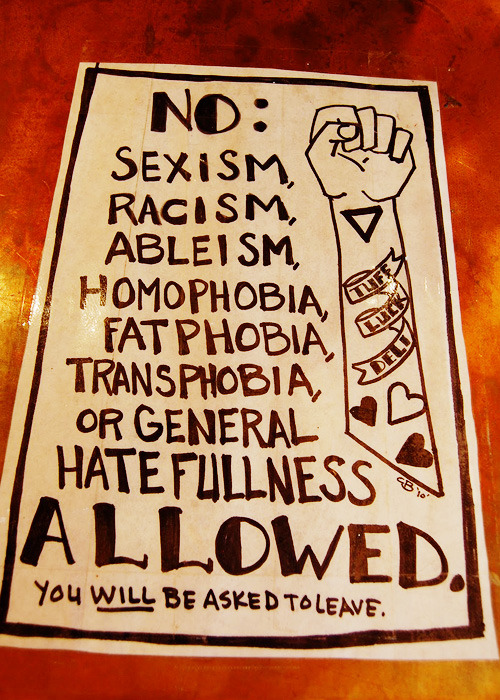 I need a poster like this for my house.  Right below the “Body Police Are Pigs” painting :)