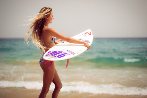 I miss skimboarding!  I had an airbrushed Zap carbon comp board.  She was my best