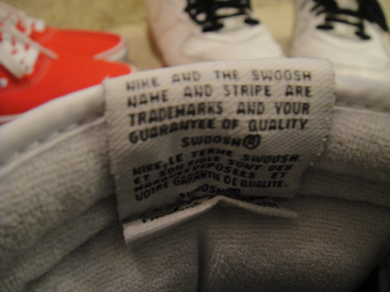 SWOOSH NAME AND STRIPE ARE TRADEMARKS 