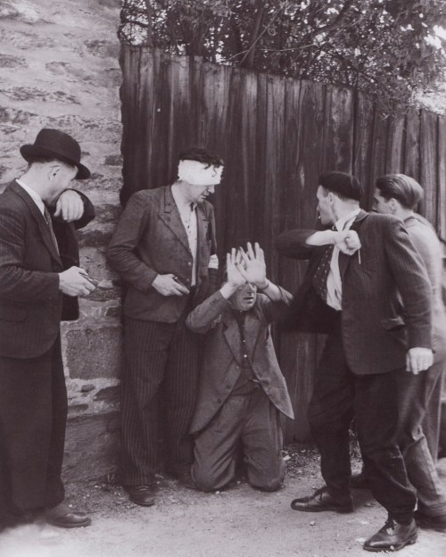 Bob Landry, Rennes, France, 1945 French patriots confronting a German collaborator.