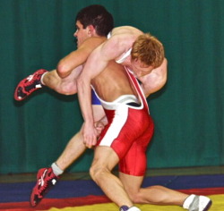 His singlet is REALLY low-cut..