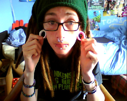 fuckyeahstretchedears:  My ears are now 30mm (left) and 28mm (right). My goal size