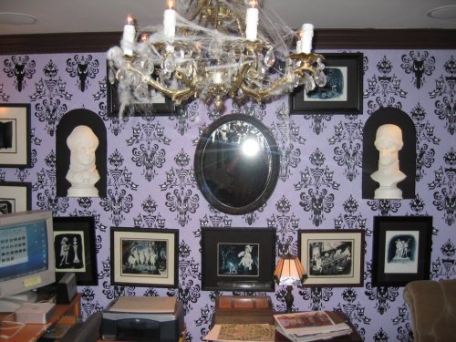 hauntedmansion:  When California-based animator James Lopez moved into a new house a few years ago, he decided to decorate his home office like Disney’s Haunted Mansion. He went so far as to sculpt and build his own bat stanchions and library busts.