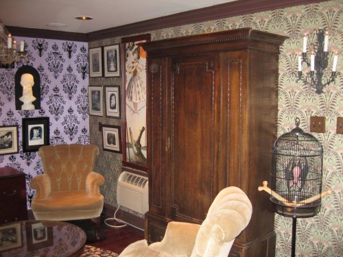 hauntedmansion:  When California-based animator James Lopez moved into a new house a few years ago, he decided to decorate his home office like Disney’s Haunted Mansion. He went so far as to sculpt and build his own bat stanchions and library busts.