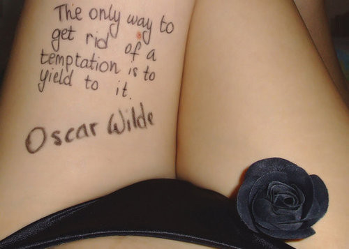 XXX an entire quote written on her thigh :) photo