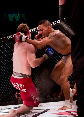 Jockstrap band and crazy bulge seen in this MMA fight.