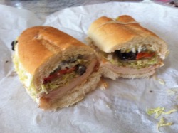 sexpoetry:  Subworks’ sliced buffalo chicken with lettuce, yellow American cheese, onions, green &amp; red peppers, olives, jalapenos, a little bit of mayo, and spovo (salt, pepper, oil, vinegar &amp; oregano). It’s better than what you’re eating.