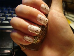 fuckyeahglitterandsparkles:  My nails right now :]  Essie FijiSephora by OPI Only Gold For Me Topcoat   