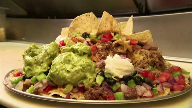 oscarthegrouser:  Mount Nachismo5lb nacho platter.  I think nachos are by far my