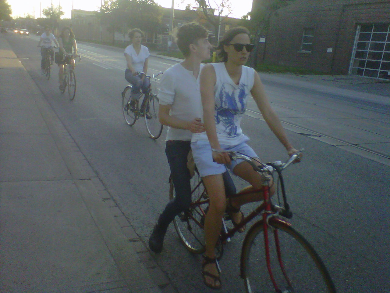 BEAUTIFUL BICYCLISTS IN THE CITY