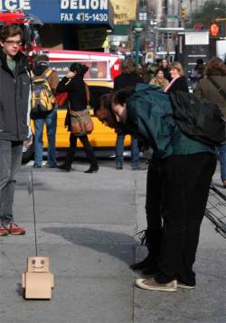 the-milk-eyed-mender:   Tweenbots by Kacie Kinzer: Given their extreme vulnerability, the vastness of city space, the dangers posed by traffic, suspicion of terrorism, and the possibility that no one would be interested in helping a lost little robot,