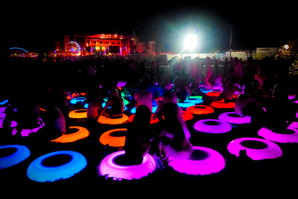 stillsoflife:  neon rubber lily pads at EDC that changed color when you stepped on