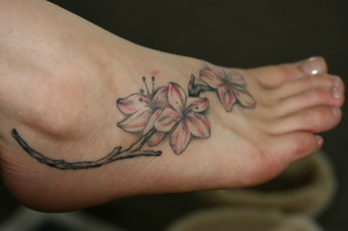 Orchid flower tattoo