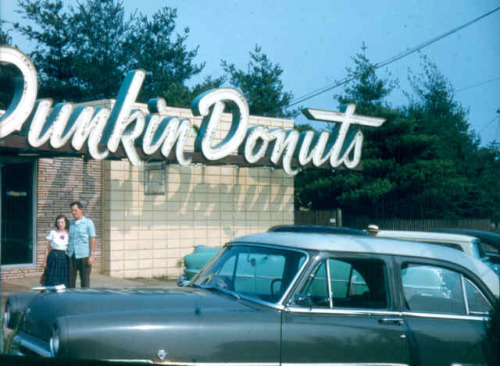 oldnewengland:  A couple outside of a Dunkin’ Donuts in Wareham, MA in the 1950s.