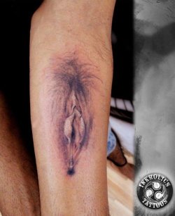 blueguitar:  obcomar:  NO  how is having a vagina tattooed on your arm NOT girl-repellent??? for that matter, he just lost out on a lot of gay sex, too… but, i do believe that in this crazy world of ours there is a perfect someone for this boy. surely,