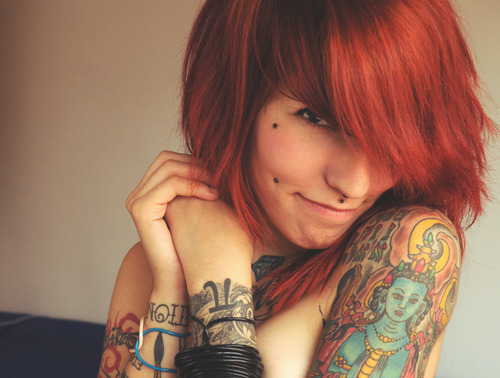 Inked redhead cutie.