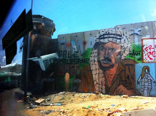 Palestinian side of the wall approaching a checkpoint near Jerusalem
