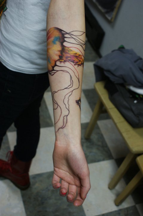 The tentacles on my jellyfish wrap up around my bicep and around my forearm.
It was the action of getting the tattoo, not the image, that was important to me.