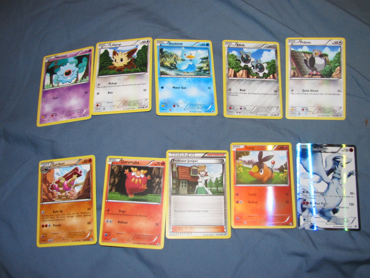 and a pack of pokemon cards got a reshiram B)