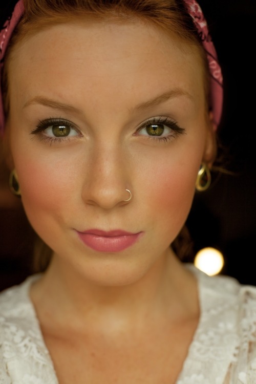 Cute girl with nose piercing