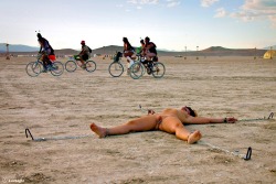 luvbight:  luvbight: “Always Secure Your Valuables in the Desert.” Model: Dee Luvbight, Location: Burning Man 2004 The wind storms and the dust devils at Burning Man are notoriously fierce; the best way to secure something to the playa is a 2’ piece