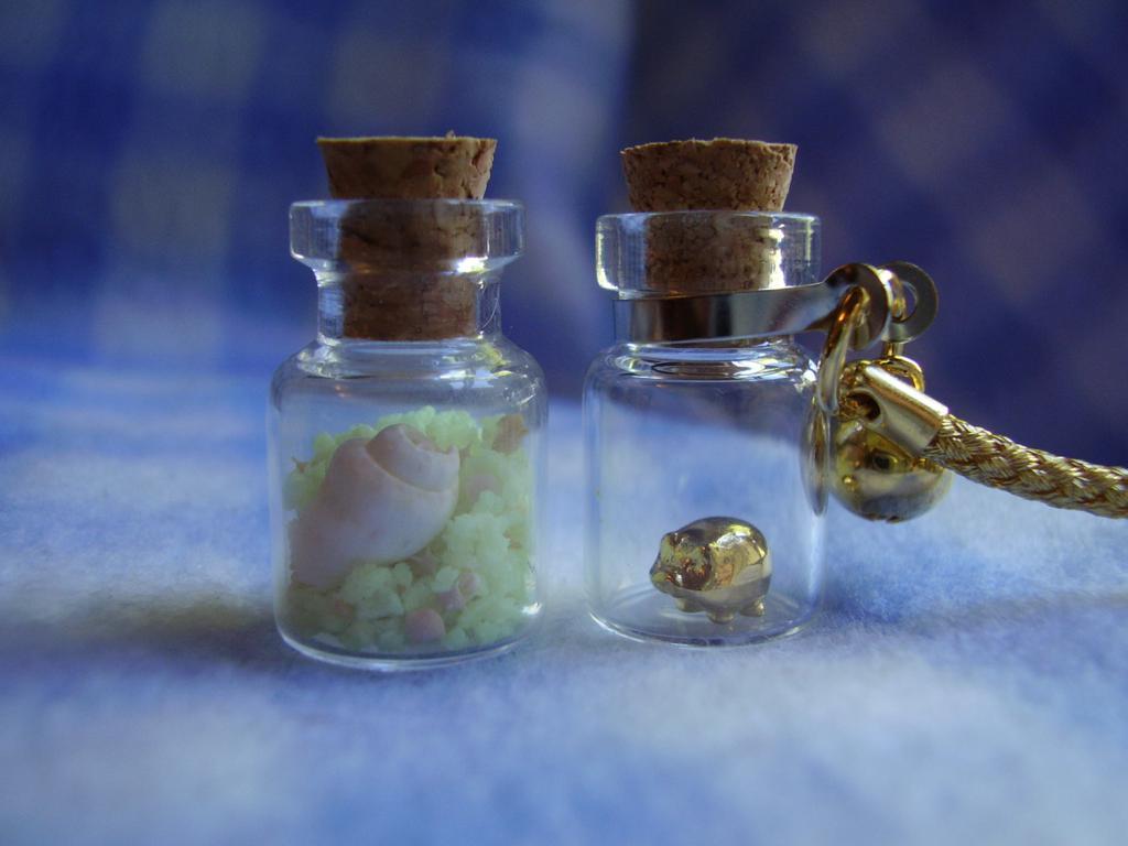toader:  newest additions to my bottle collection (the sand glows blue!)  i have