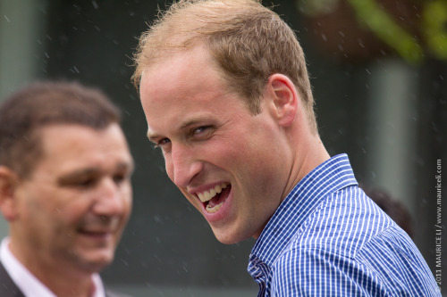 Prince William has a laugh despite the rain after his team won the Dragon Boat race two days ago at Dalvay-by-the-Sea in PEI.