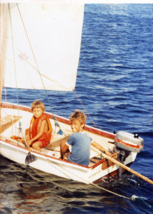 Children of circumnavigating yachts Pampero II and Freebooter sailing around in a dinghy, handling a