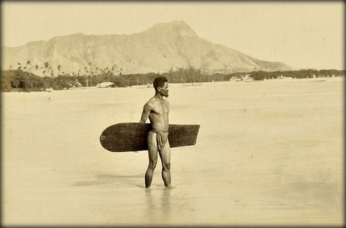 Believed to be the first known photograph ever taken of a surfer.Surfing was banned in Hawaii by mis