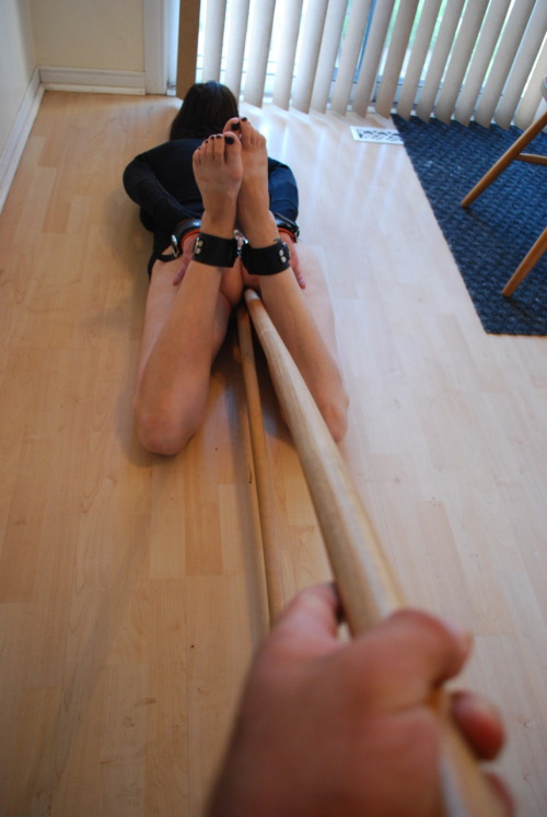 daddysfucktoys:  Double poked sluttybunny:  Hogtied on the floor - One broom handle in my pussy and my master fucking my ass with another broom handle :-)  