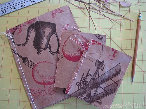 Recycled Paper Art Journals from Creative Kismet here.  This post shows you how to bind art journals