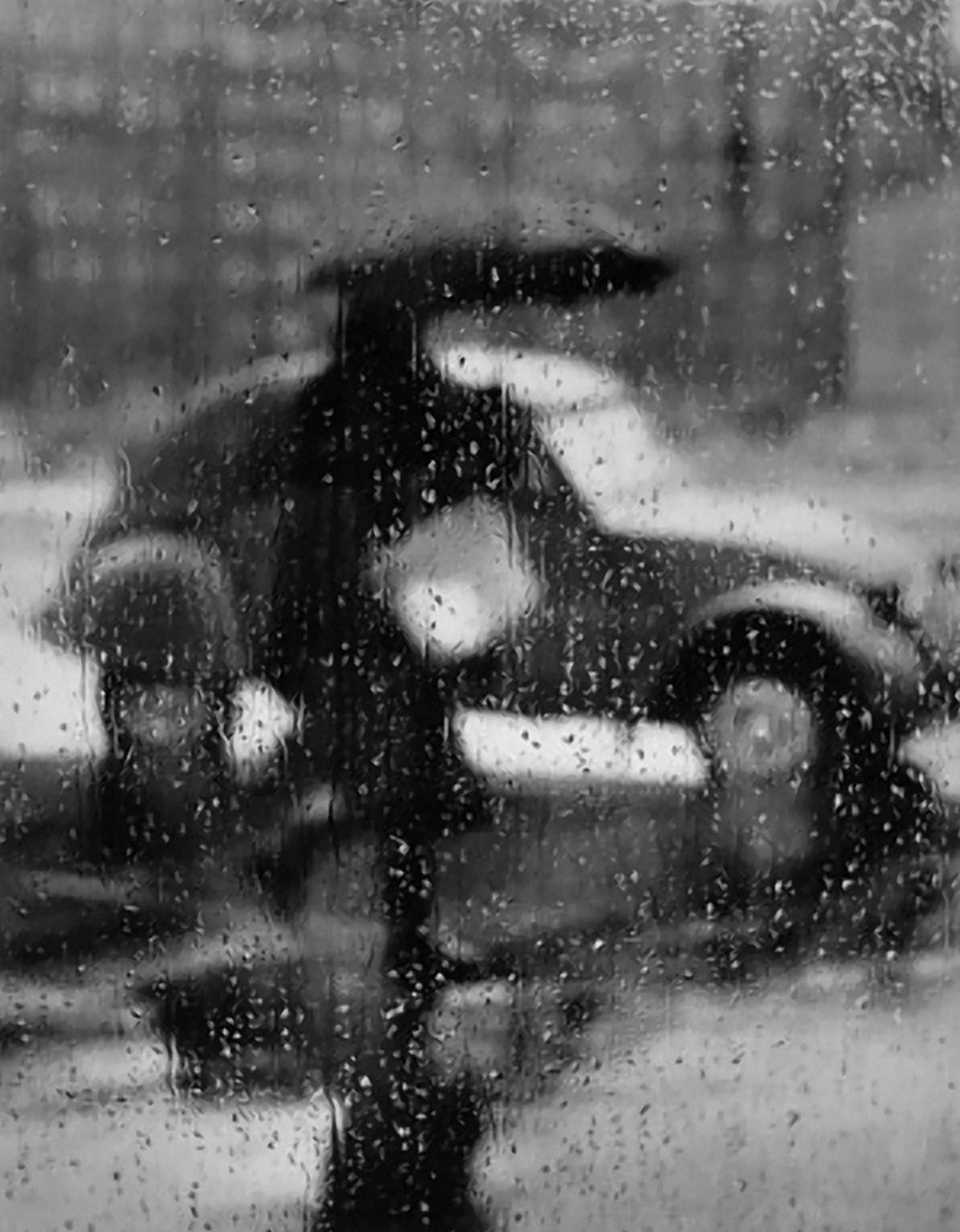 Sabine Weiss
Jour de pluie à travers une fenêtre, Paris - 1957
Thanks to undr