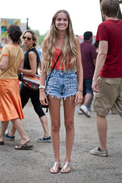 freepeople:  Festival Fashion at Pitchfork Music Festival. Sophia Mondi, wearing studded denim cut offs and a perfect red vest 