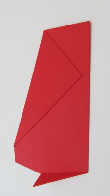 Vertical Red Envelope, 2010. archival foam, staple, approx. 18 x 12 x 2 inches (destroyed)