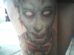 Awesome zombie tattoo a girl had on her thigh, from two nights ago on the boulevard