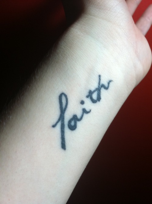 fuckyeahtattoos:  Faith. One simple word that means so much. This was my first tattoo, done by my friend Mark. The “F” is also the Christian fish & a cancer ribbon, in memory of my Aunt that passed away a few years ago. Anytime times are rough,