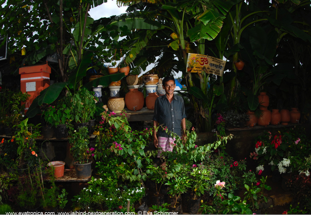 Mumbai - Dinesh in his street flower shop