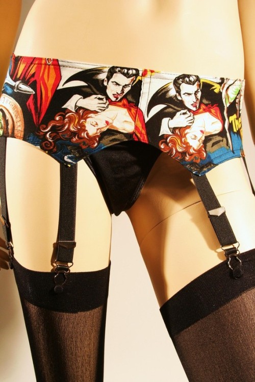 mikan-mikan:  sunshinedusk:  The garter I’ll be wearing for my audition :3 Featuring Frankenstein on the front of mine as well as Dracula, the Wolfman and the Mummy.  i need this! grkjge 