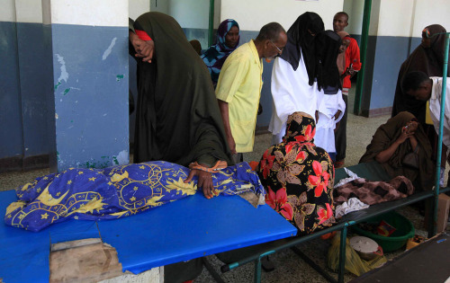 maced: A Somali woman weeps for her dead child at Banadir hospital in Mogadishu, on July 21, 2011.&n