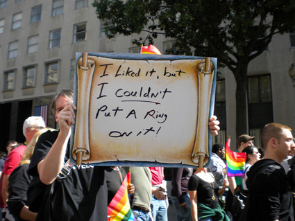 gmhmlia:  redlockz:   Gay rights activists: known universally for their awesome signs  Some people just win at life.  That’s right. You wish you thought of that. 