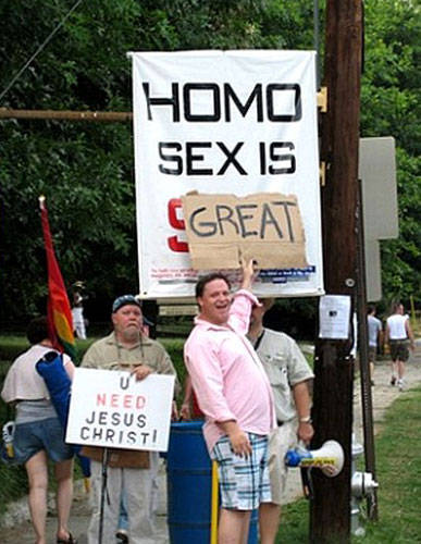 gmhmlia:  redlockz:   Gay rights activists: known universally for their awesome signs  Some people just win at life.  That’s right. You wish you thought of that. 