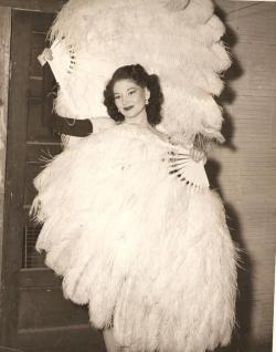 An Unknown Fan Dancer, Poses Backstage..